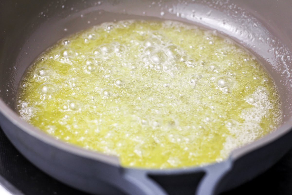 Browning butter in a pan on the stove.