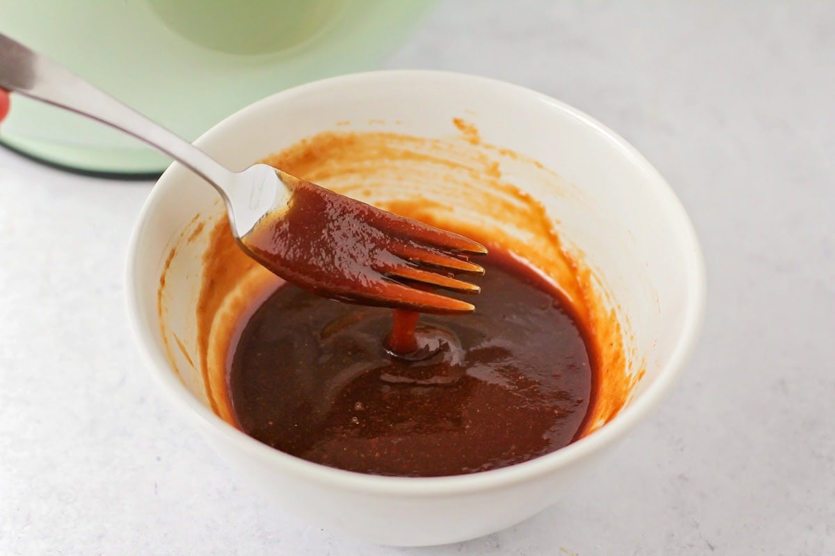 Homemade sauce for easy meatloaf recipe in small bowl.