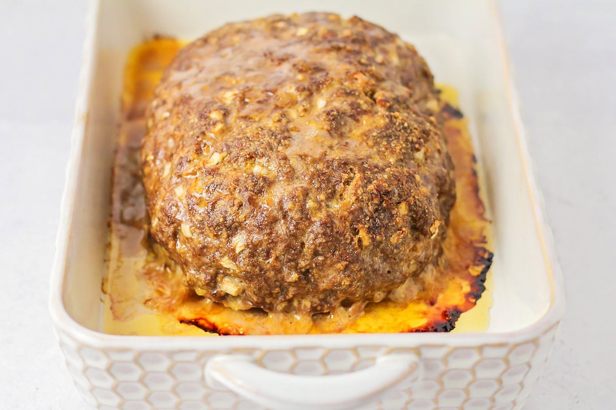 Baked meatloaf recipe in baking dish.