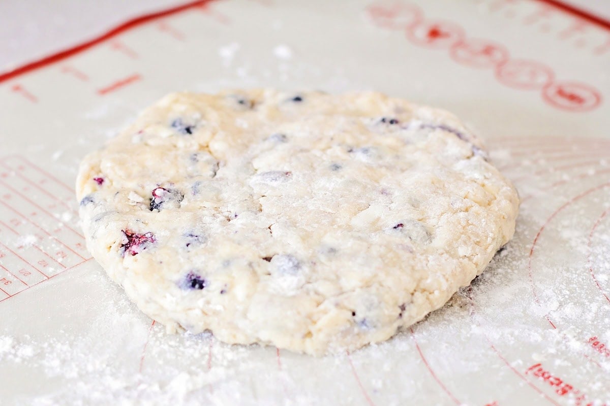 Scone dough shaped into a round.