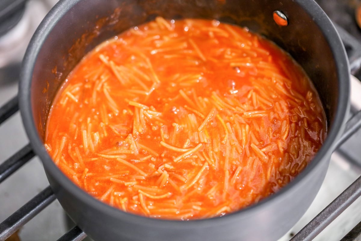 Process shot of how to make fideo.