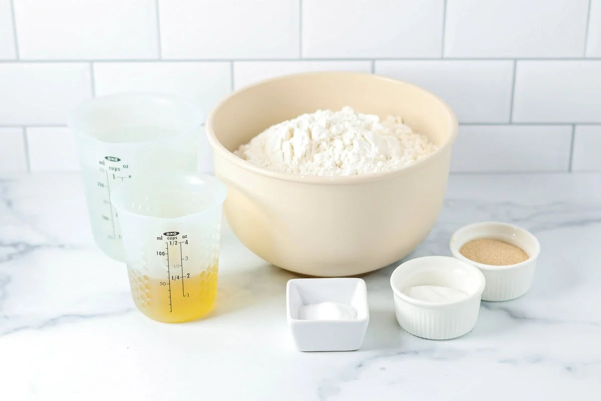 Sub roll recipe ingredients on a kitchen counter.
