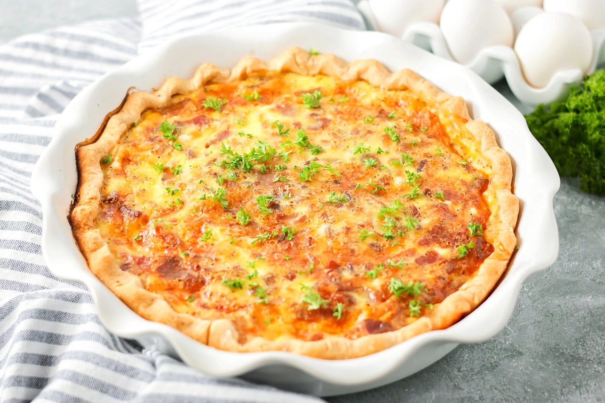 Homemade quiche recipe baked in pie dish.