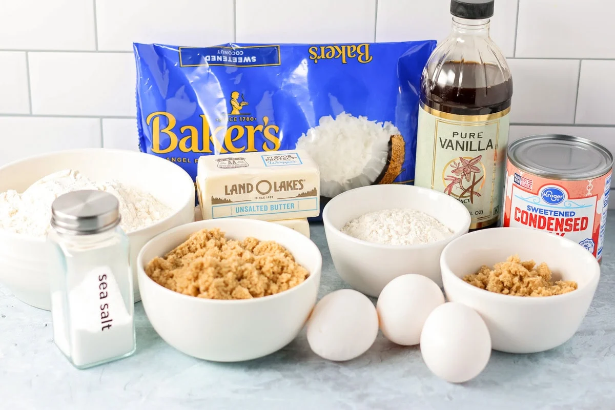 Ingredients for coconut bars on a kitchen counter.