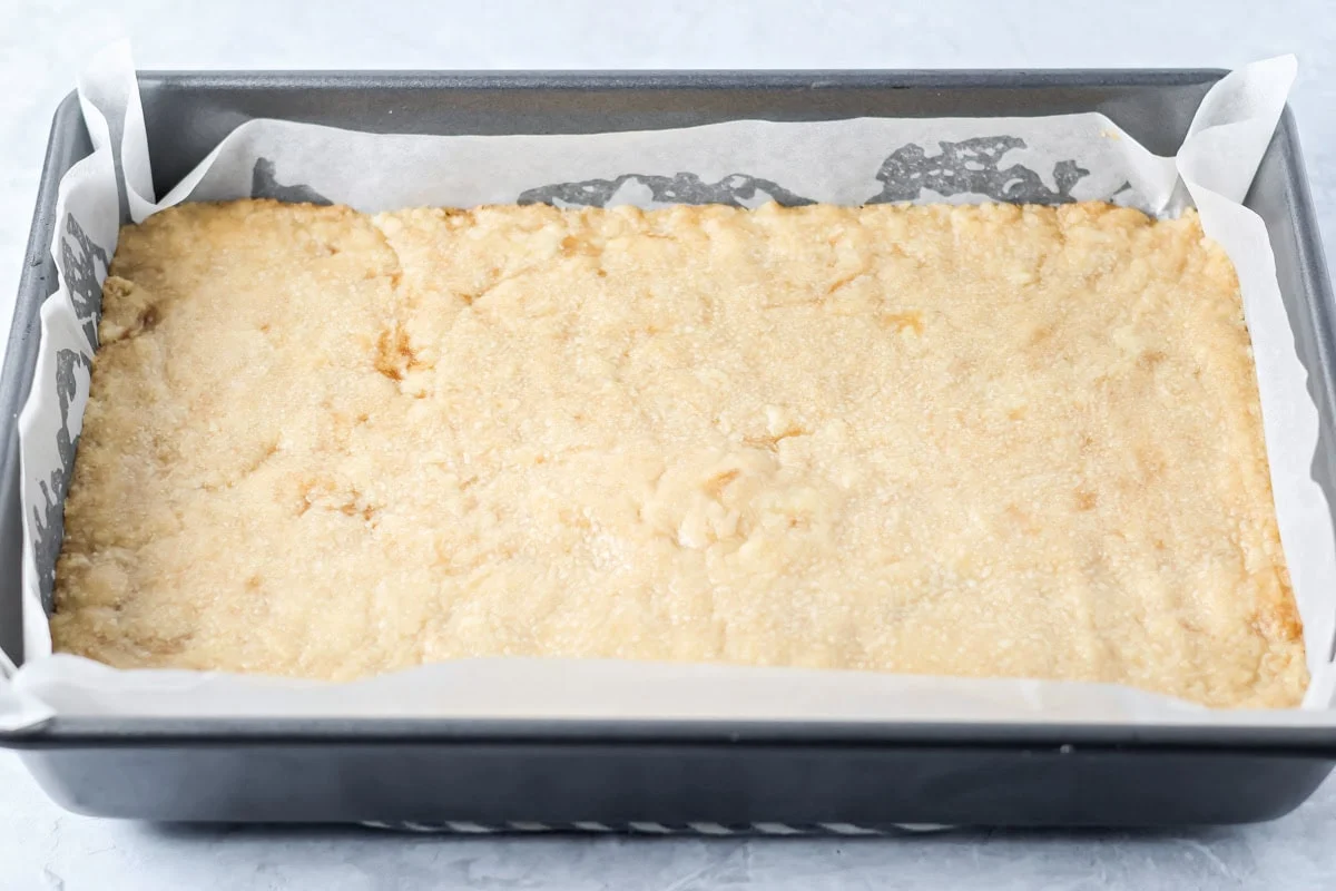 Baked shortbread crust in a pan.