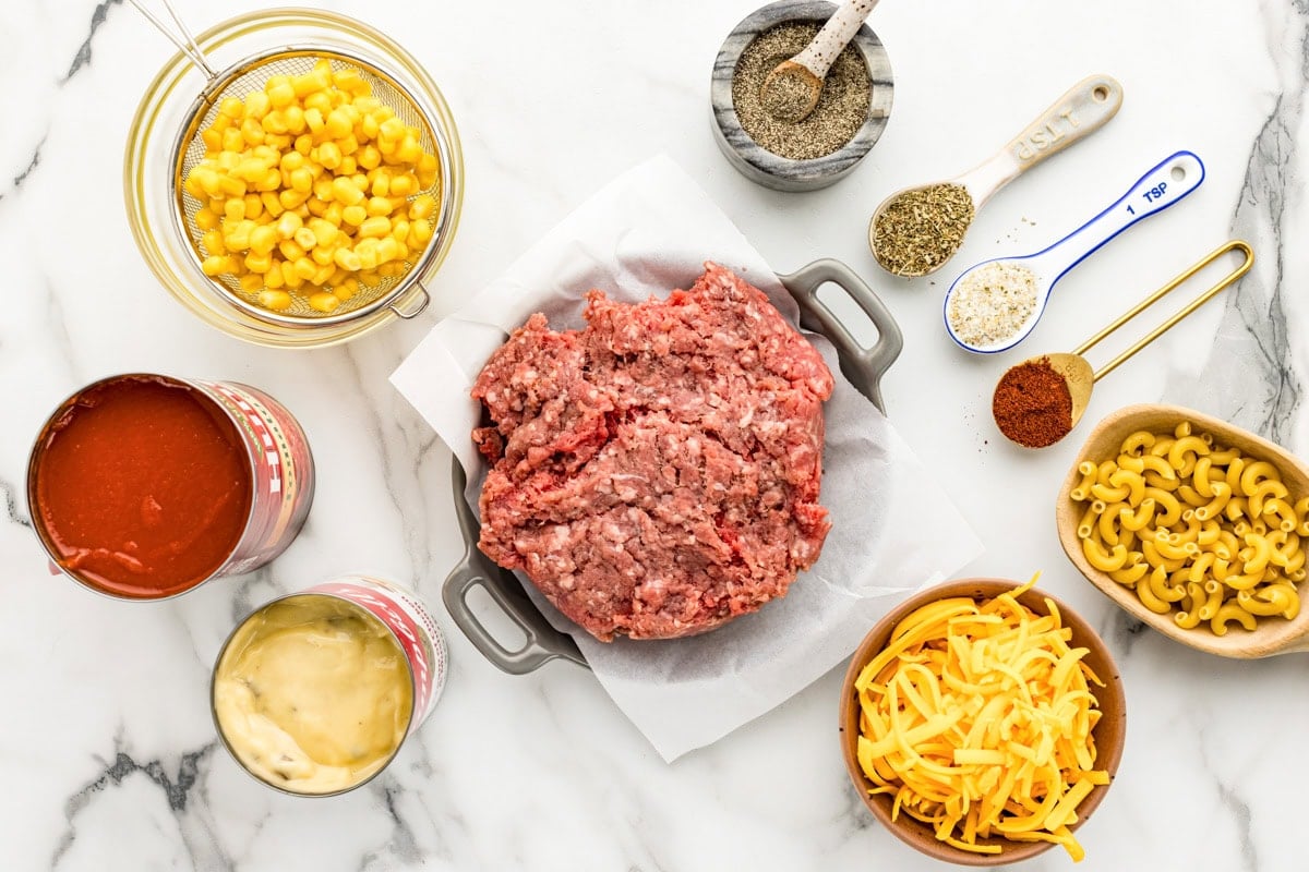 Ingredients for hamburger casserole on a kitchen counter.