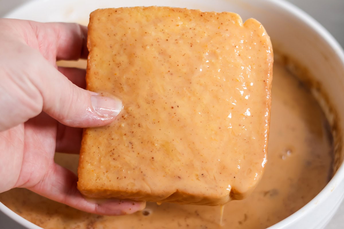Infused with warm spices and pumpkin, this quick and easy pumpkin French toast transforms breakfast into a cozy, decadent fall favorite! Dipped toast in an egg mixture.