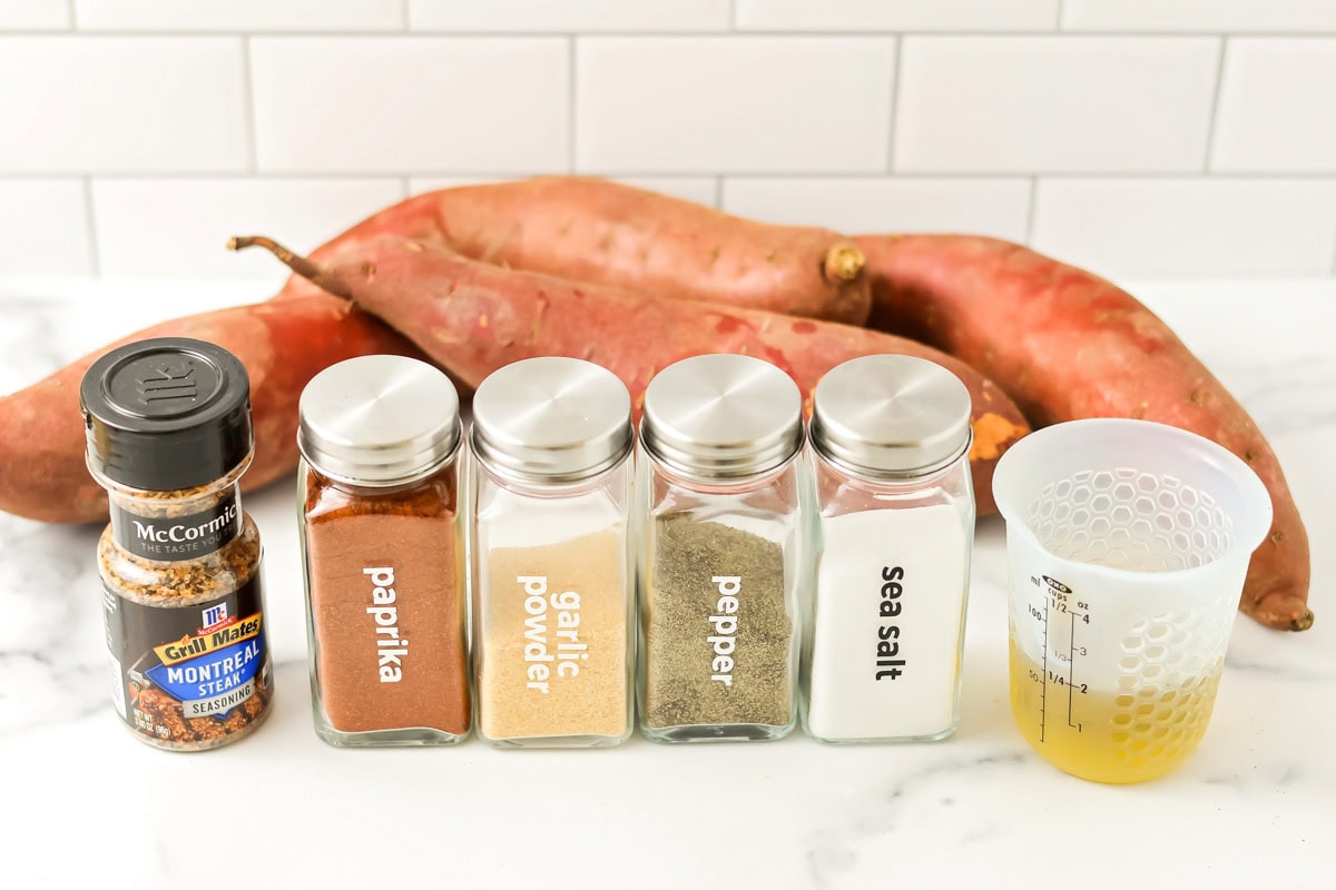 Ingredients for baked sweet potato fries on a kitchen counter.