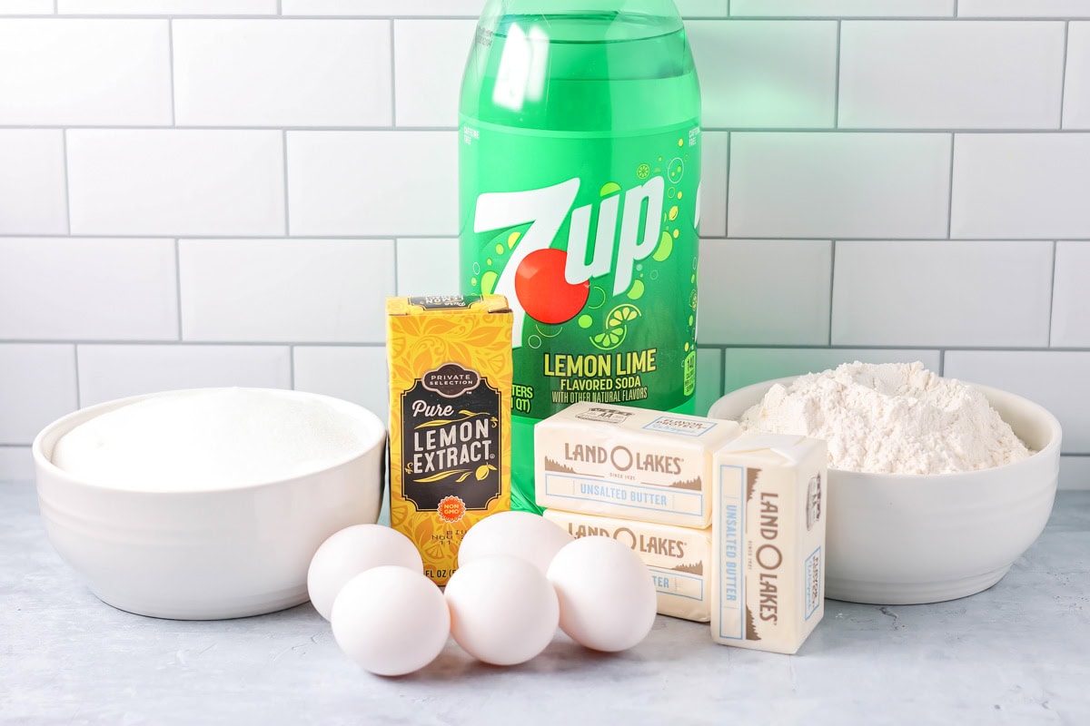 All the ingredients needed to make a 7 Up Cake on a kitchen counter.