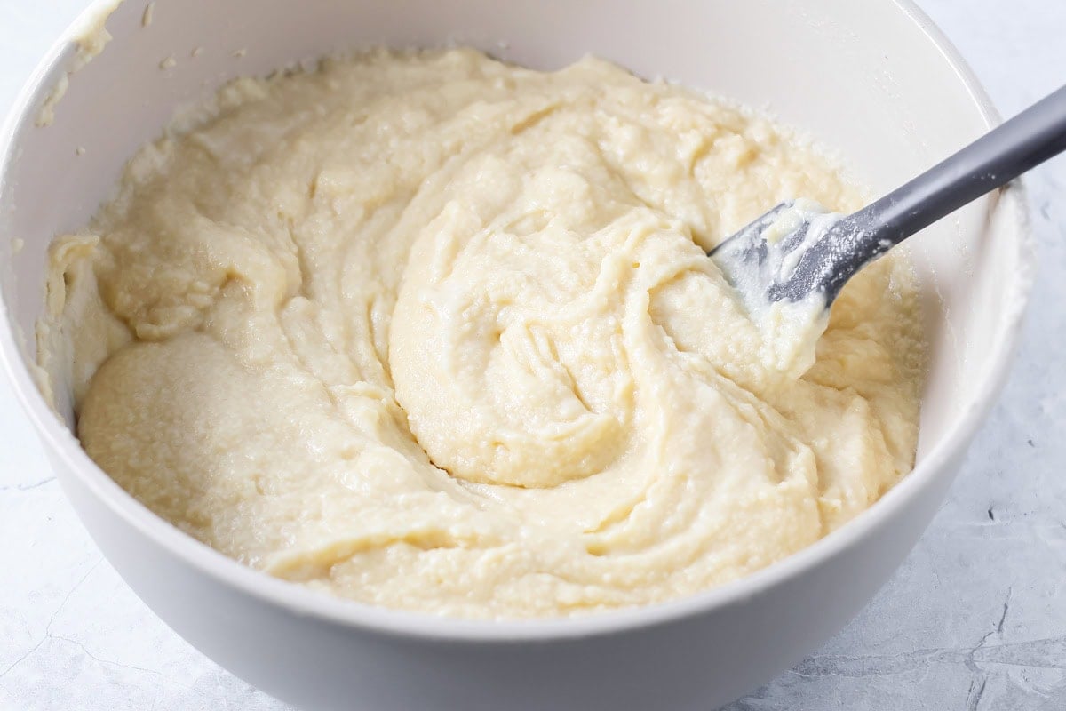 Mixed cake batter in a bowl.