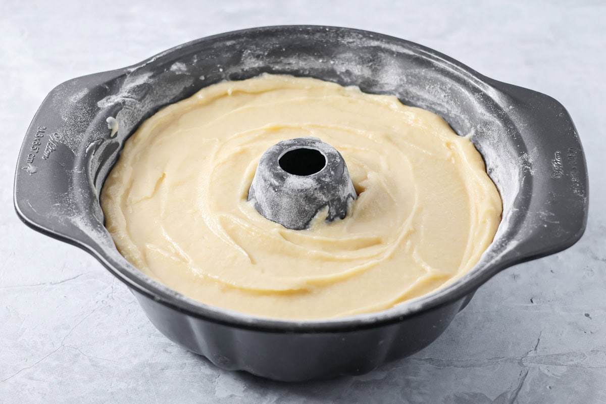 Cake batter in a bundt cake pan.