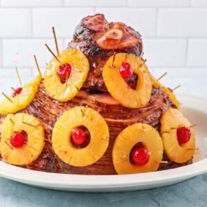 Christmas ham on a serving tray.