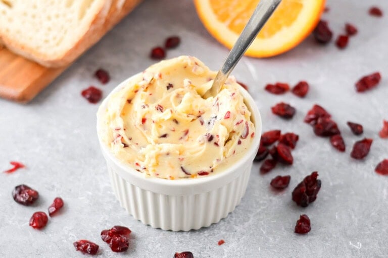 Cranberry honey butter in white rammekin.
