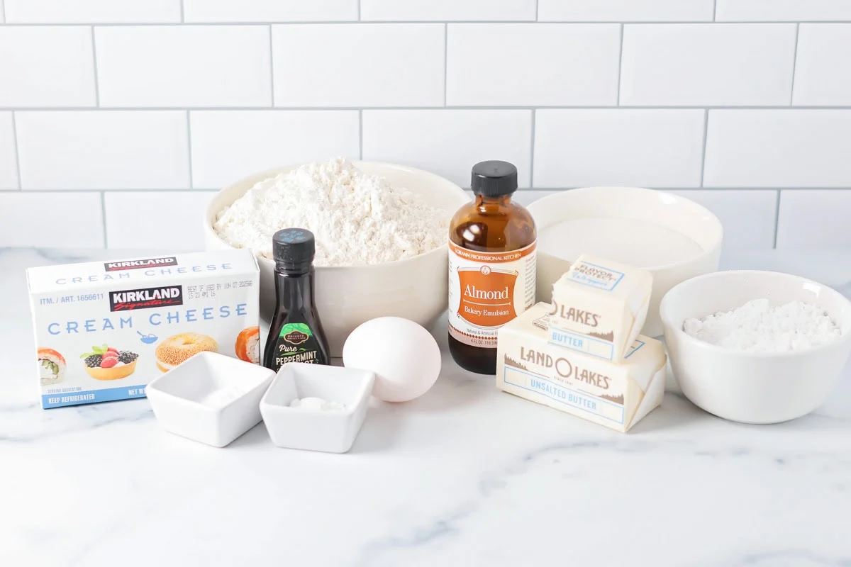 Ingredients for peppermint sugar cookies on a kitchen counter.