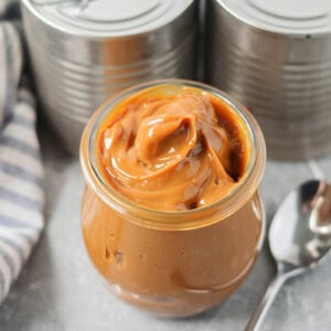 Glass jar with homemade dulce de leche.