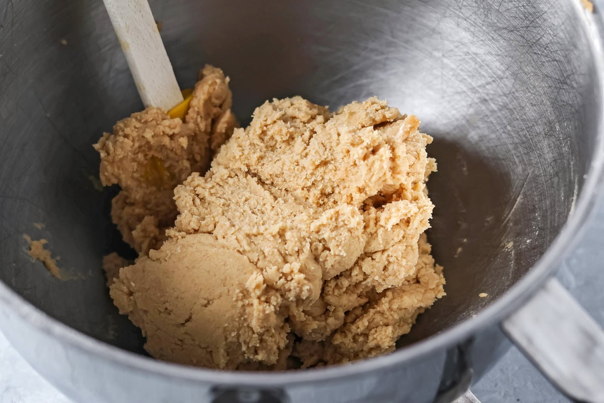 These easy and cute Peanut Butter Spider Cookies are the perfect sweet treat to get you in the spooky spirit. Peanut butter cookie dough in a mixing bowl.