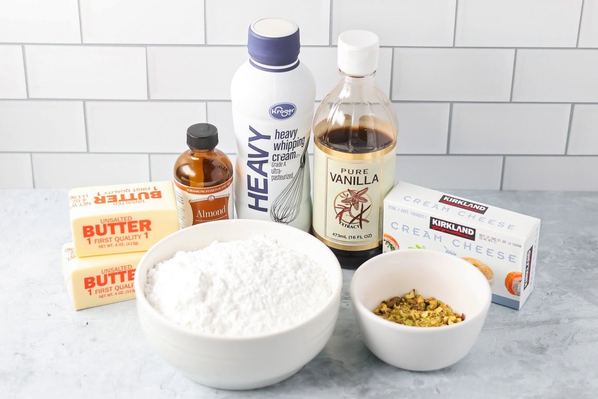 Ingredients to make cream cheese icing on a kitchen counter.