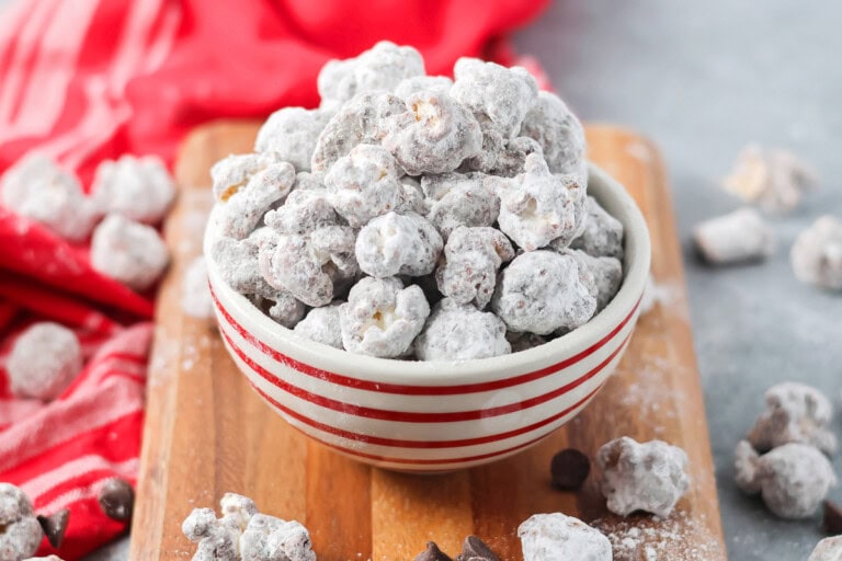 Puppy chow popcorn in a small bowl.