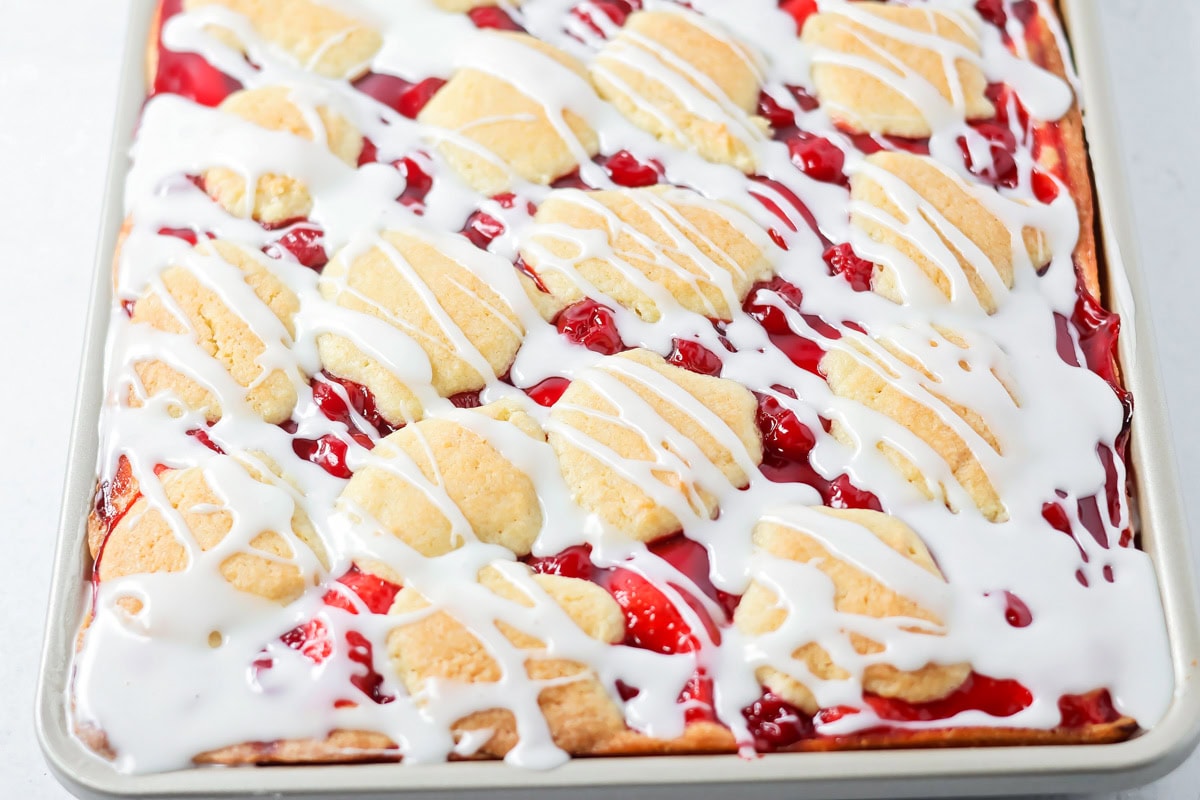 Cherry bars drizzled with glaze.