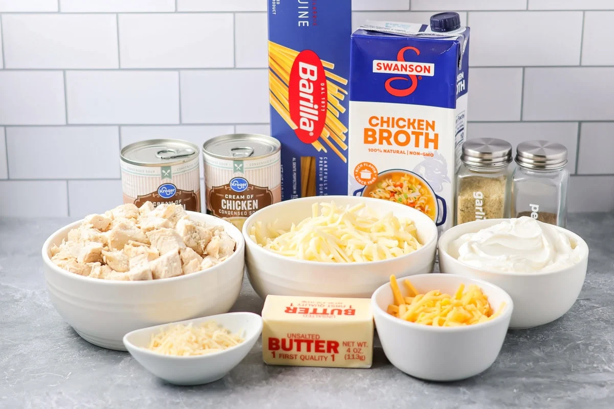 Ingredients to make chicken tetrazzini on a kitchen counter.