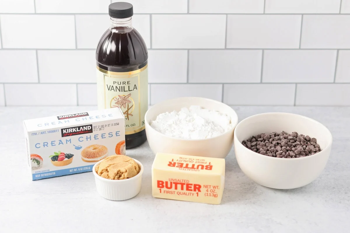Ingredients to make chocolate chip dip on a kitchen counter.