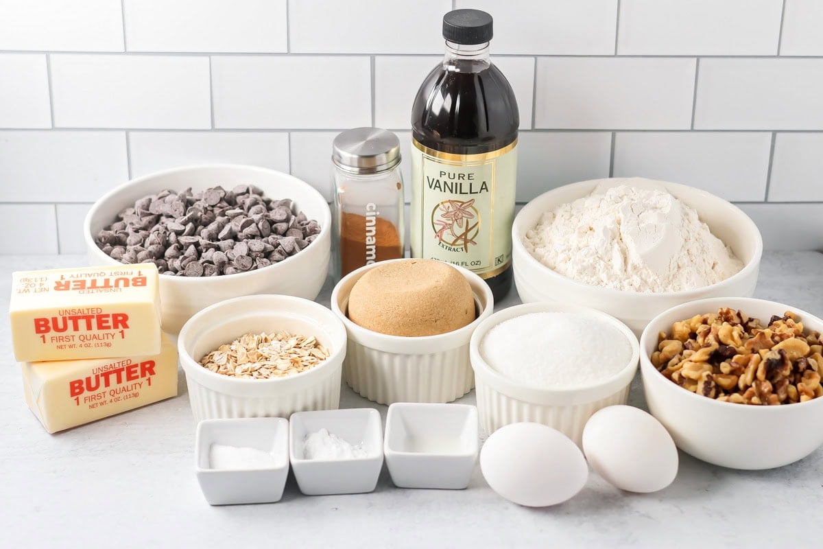 Copycat Doubletree Cookies are big, chewy, and baked soft in the center with crisp edges for the ultimate treat. Ingredients to make Copy cat Doubletree cookies on a kitchen counter.