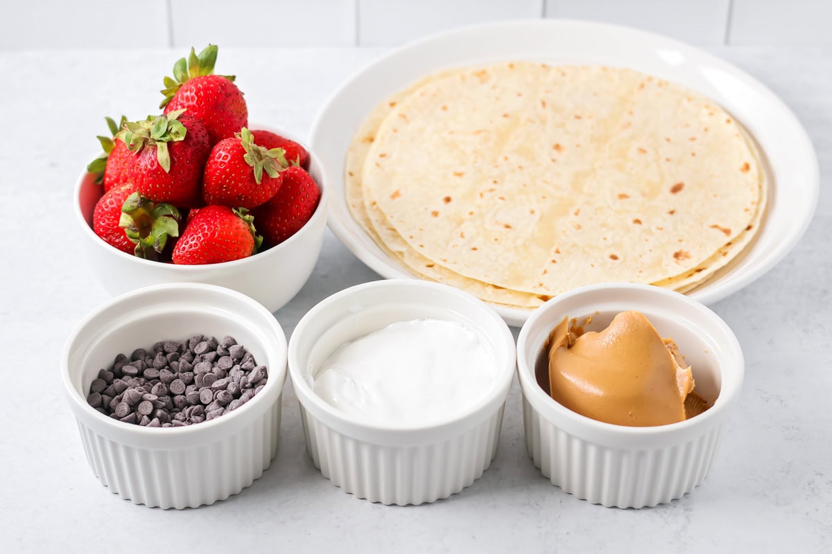 Ingredients for dessert quesadillas on counter.