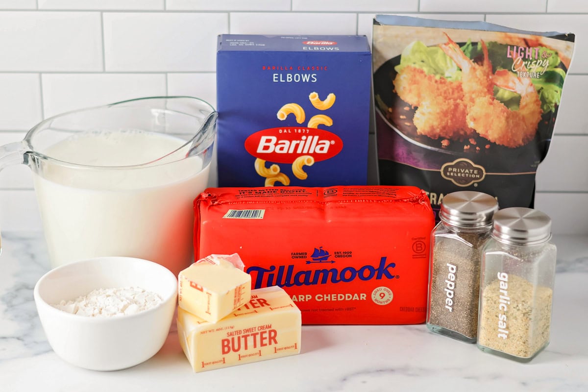 Homemade mac and cheese recipe ingredients on counter.