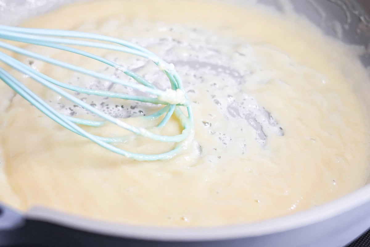 Roux for mac and cheese sauce being made in skillet.