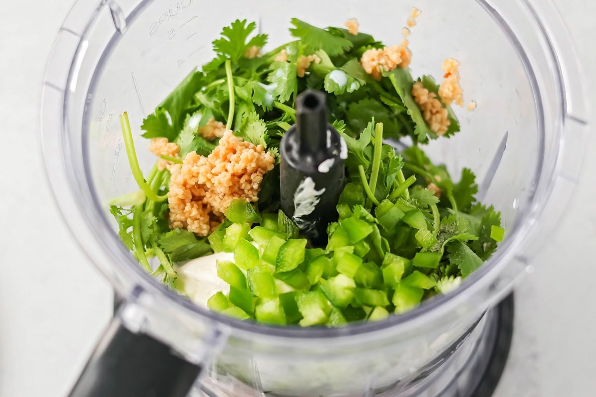 Cilantro dressing ingredients in blender.