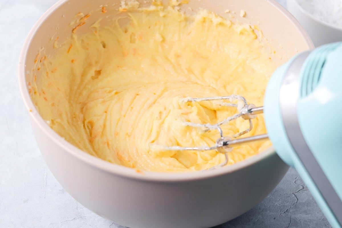 Soft orange brownies are made with simple ingredients, a quick bake, and a bright flavor that makes every slice feel special. Creaming butter and sugar in a mixing bowl.