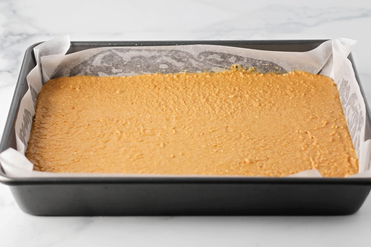 Peanut butter base for no bake peanut butter bars in 9x13 pan.