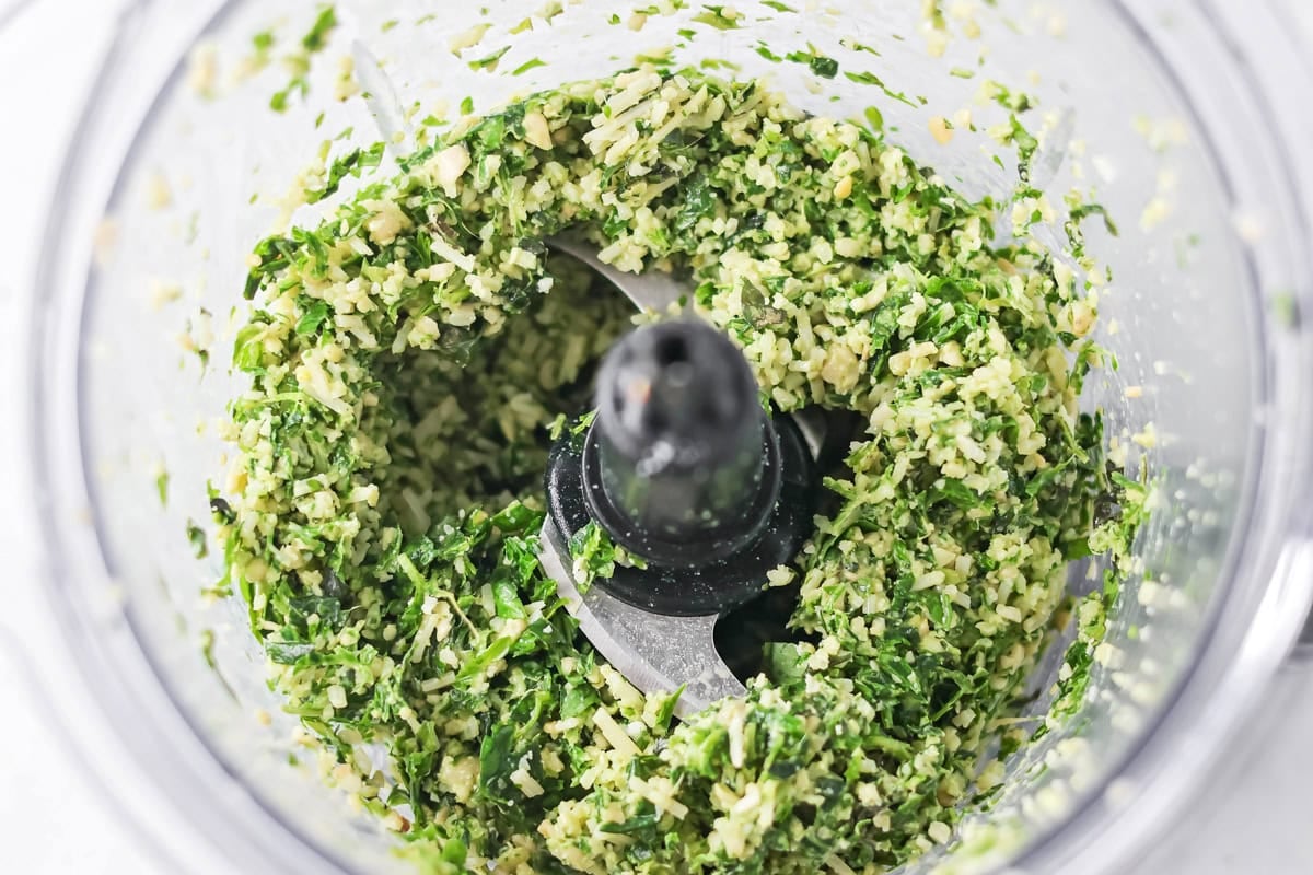 Fresh homemade basil pesto is easy and quick to make. From pasta to sandwiches, it will be a family favorite you use all week! Cheese added to the slightly processed herbs and nuts.