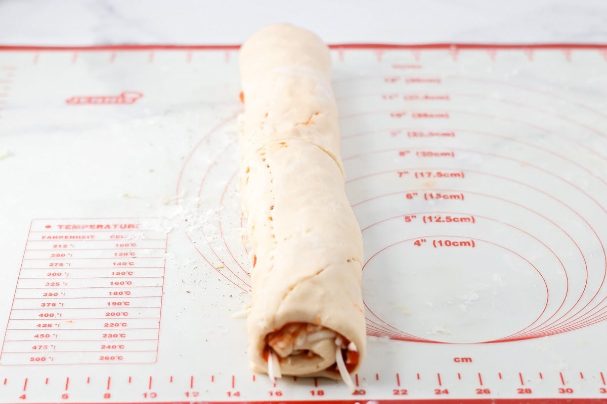 Crescent dough for pizza pinwheel recipe rolled up.