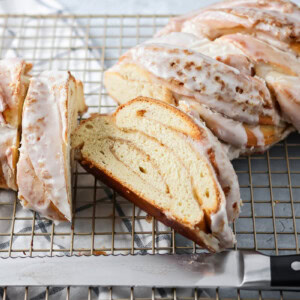 Slices of quick cinnamon twist on a wire rack.