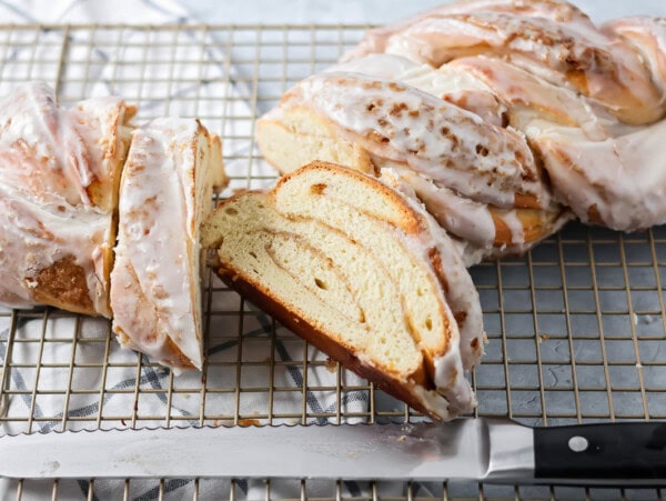 Slices of quick cinnamon twist on a wire rack.