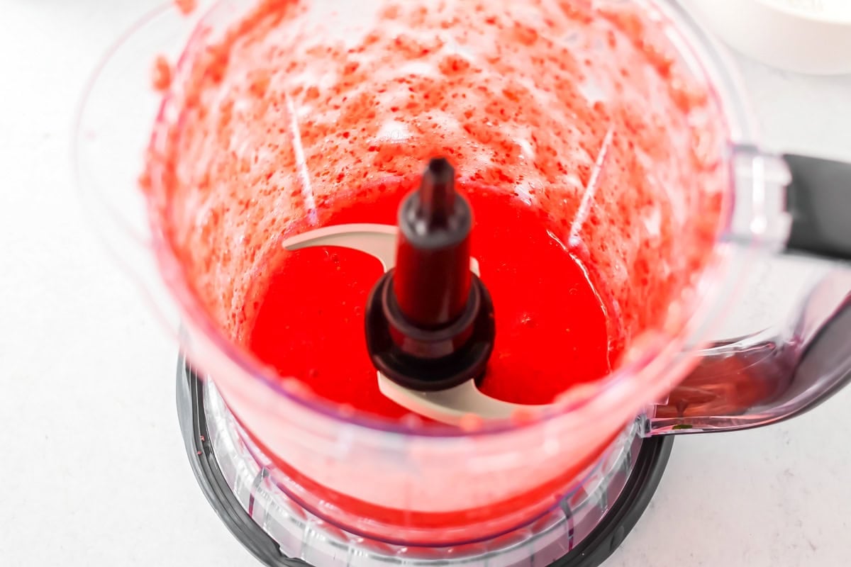 Strawberries blended in food processor.
