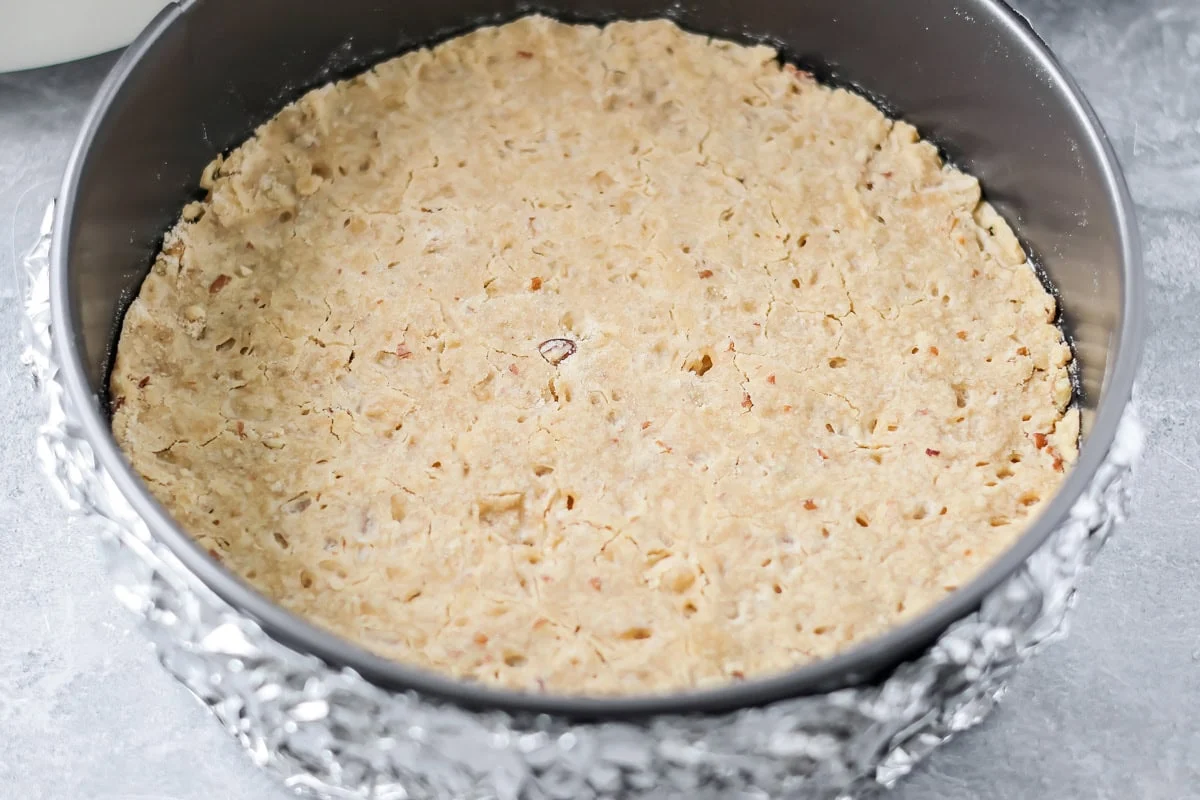 Baked crust in a springform pan.