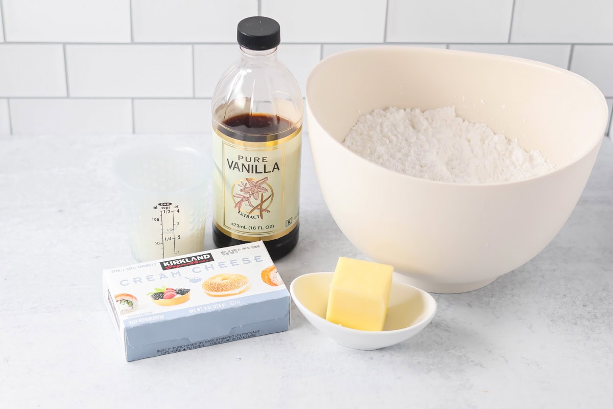 Cream cheese frosting ingredients on counter. 