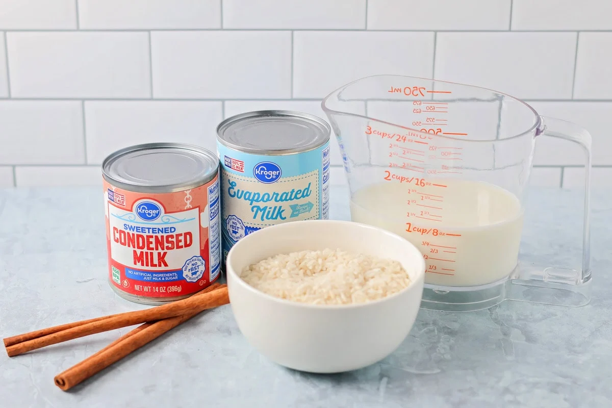 Arroz con leche ingredients on counter.