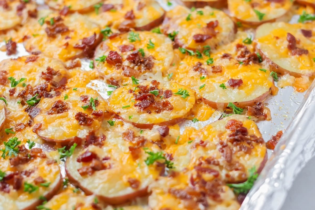 Baked potato rounds on baking sheet.