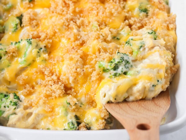 Chicken Broccoli Casserole recipe being scooped out of dish.