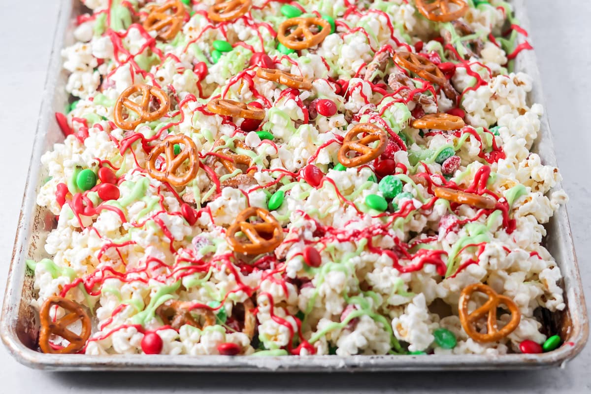 Christmas popcorn recipe on baking dish.