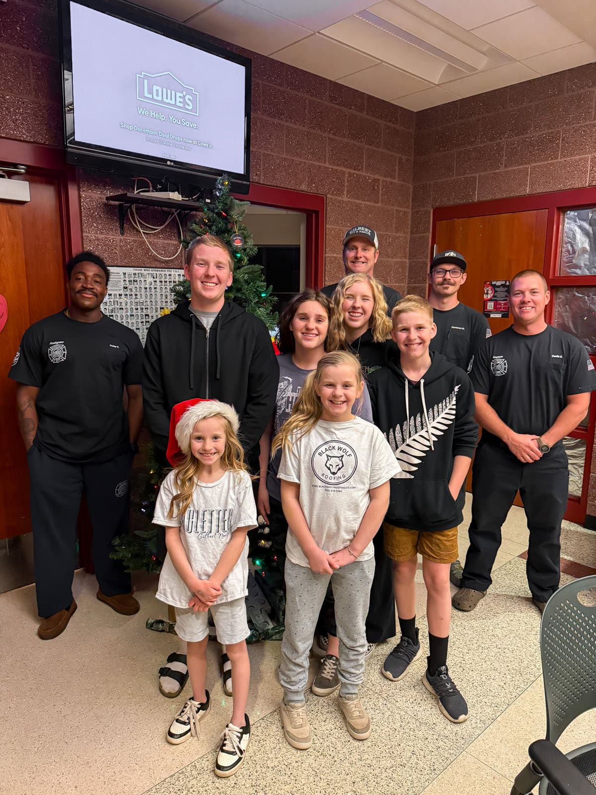 Family taking treats to the local fire department.