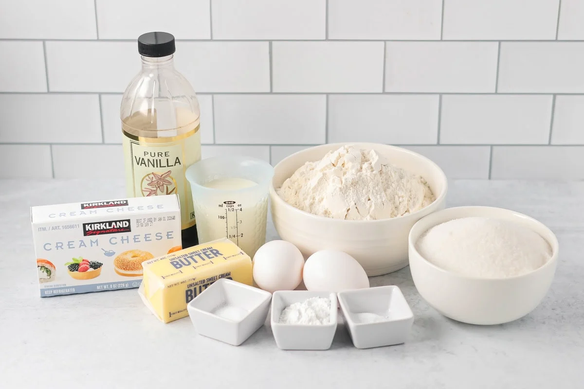 Cream cheese coffee cake ingredients on white counter.