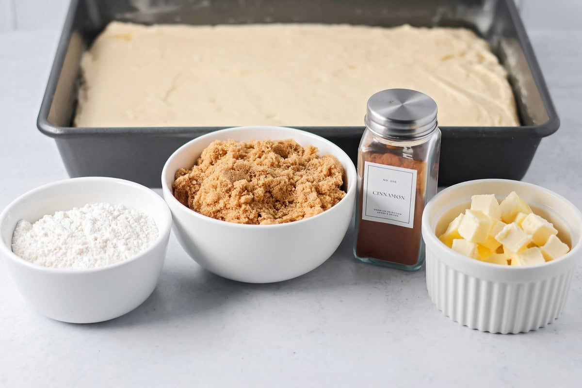 Streusel ingredients on white counter.