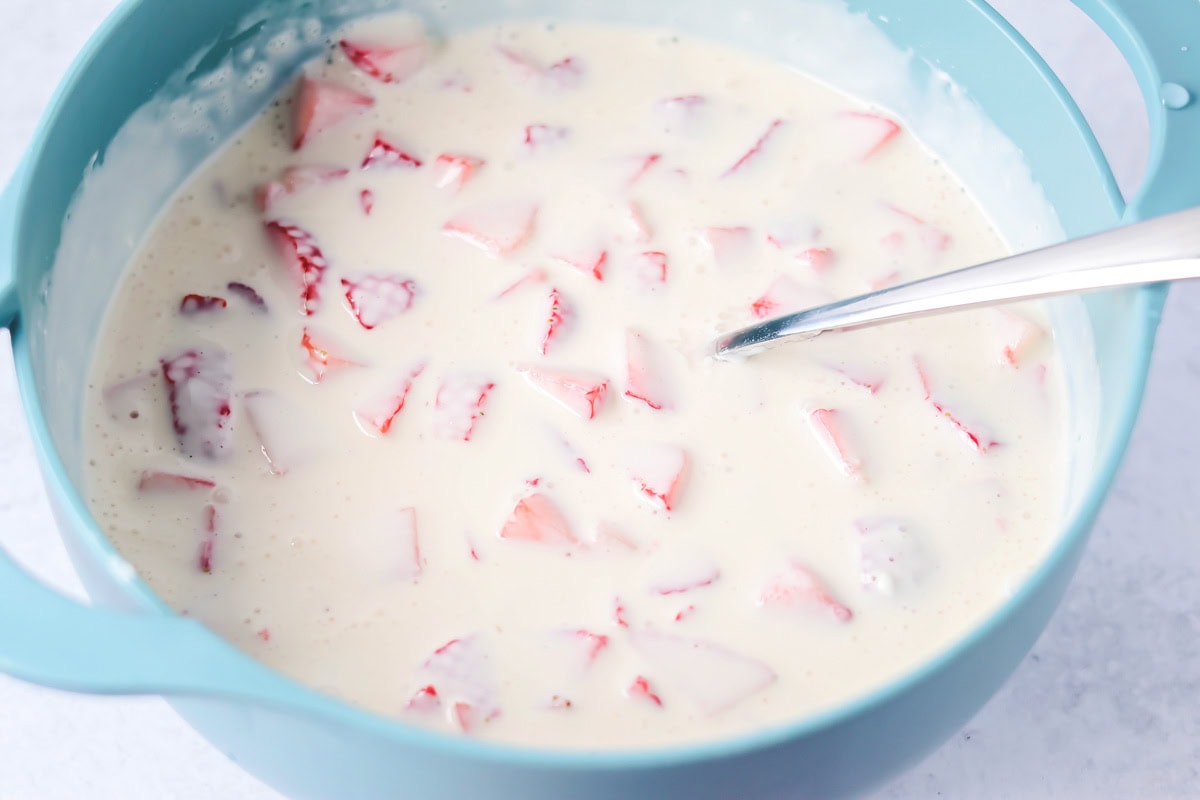 Fresas con Crema mixes strawberries with a silky vanilla cream. This 10-minute, no-bake dessert chills into spoonable perfection. Adding diced strawberries into the mik mixture.
