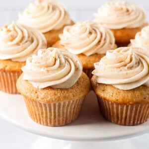 Sopapilla cupcakes on cake stand.