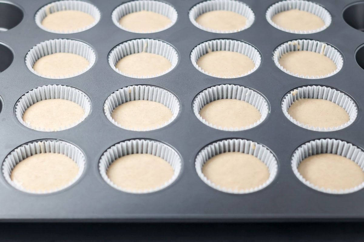 Soft cinnamon honey cupcakes with a crackly sugar top and creamy frosting, easy to make and perfect for parties or cozy weeknights. Cupcake liners filled 2/3 of the way with batter.