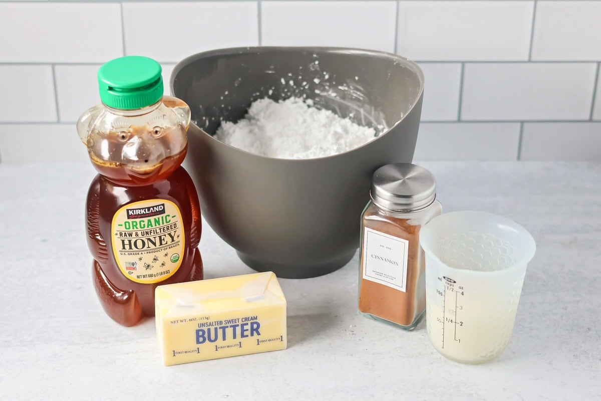Ingredients to make frosting on a kitchen counter.